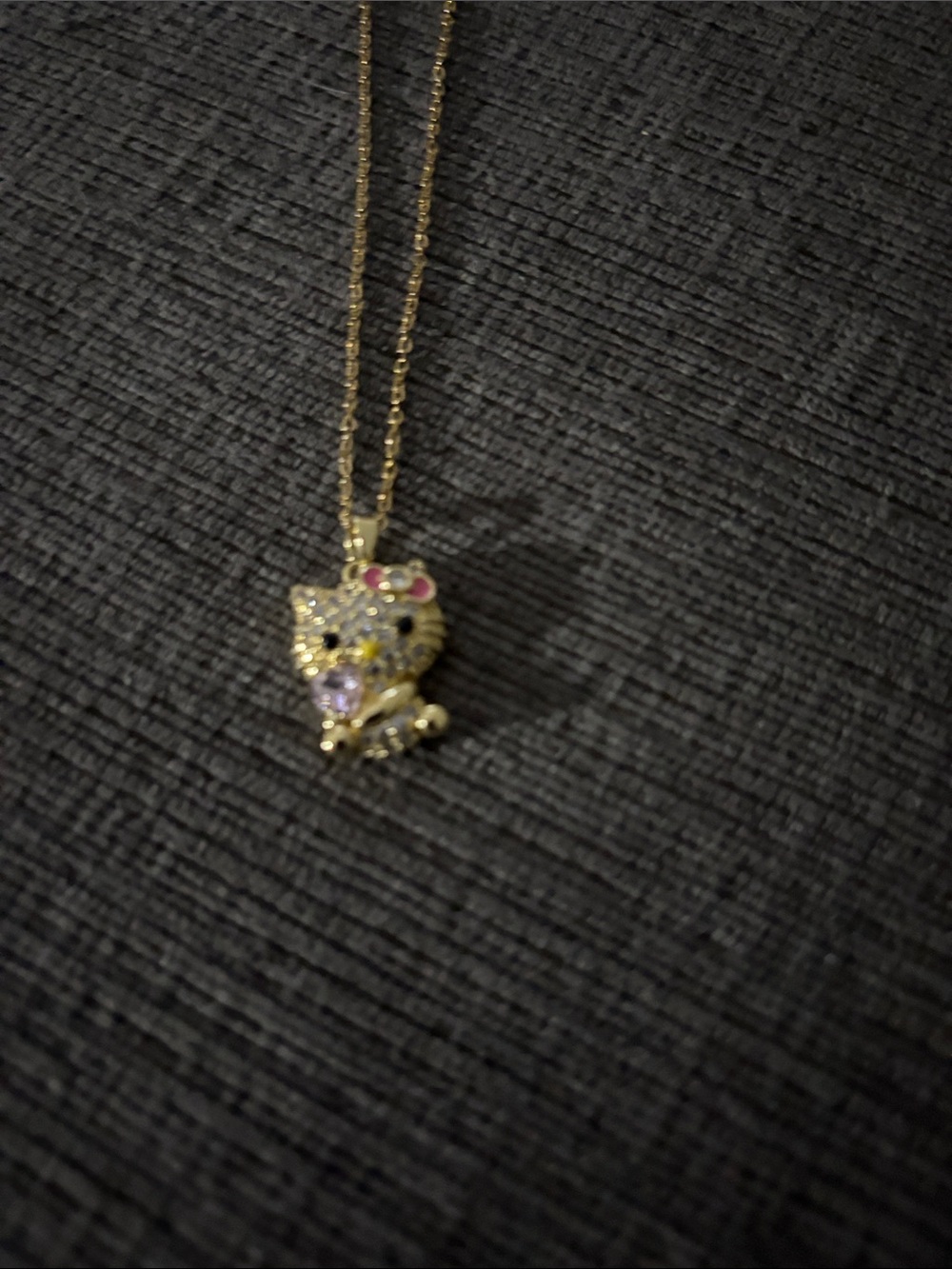 Gold Tone hello kitty Pendant Necklace with Pink Accent
